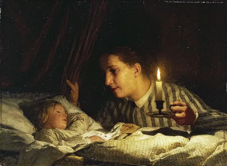 young mother contemplating her sleeping child in candlelight